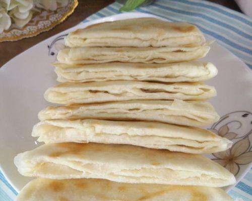 芝麻糖心千层油酥饼的制作方法（制作简单、香甜可口、口感层次分明）