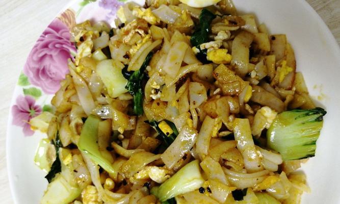秘制美味圆菜炒粉（享受美食的滋味，让你胃口大开）