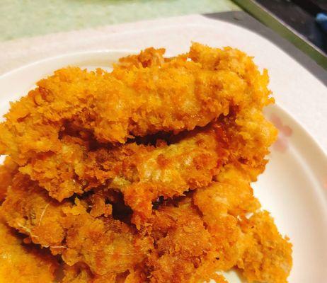 香酥鸡柳的制作方法（以油炸为主，口感鲜美的料理）