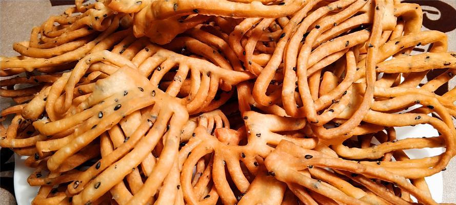 传统美食油炸撒子的制作方法（如何做出美味可口的油炸撒子）