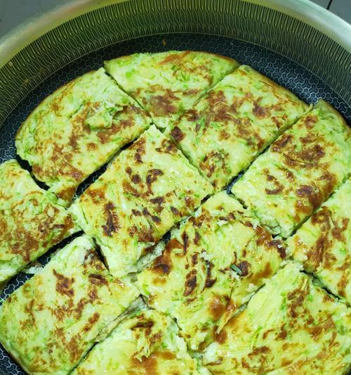 以西葫芦鸡蛋饼的制作（这是一道简单易学的家常菜）