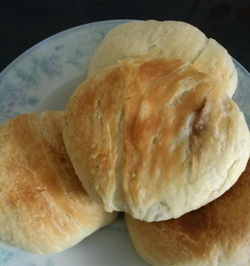 掌握乌龙酥皮肉饼的制作技巧（学习制作美味乌龙酥皮肉饼）