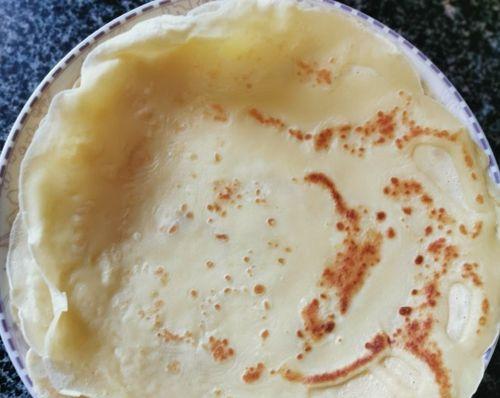 糖醋鸡蛋饼的制作方法（让你在家也能做出酥脆可口的美食）