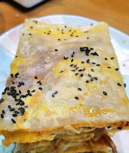 教你轻松掌握摊煎饼的技巧（以摊煎饼的做法为主题）