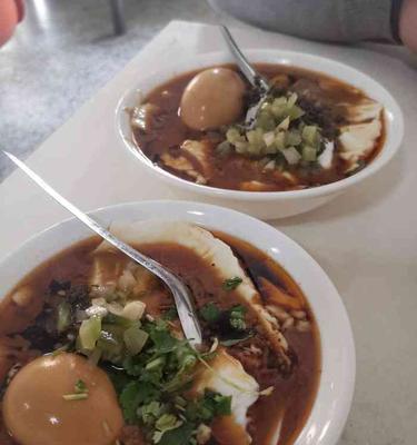 品尝商河老豆腐的制作秘诀（以传统工艺独特口感为）