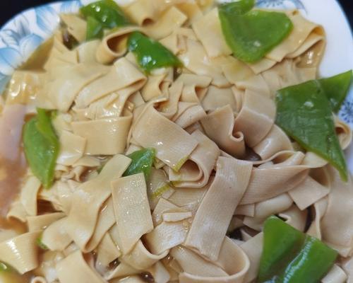 鸭丝炒干豆腐丝怎么做？步骤和技巧有哪些？