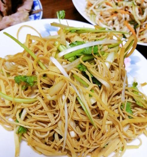 鸭丝炒干豆腐丝怎么做？步骤和技巧有哪些？