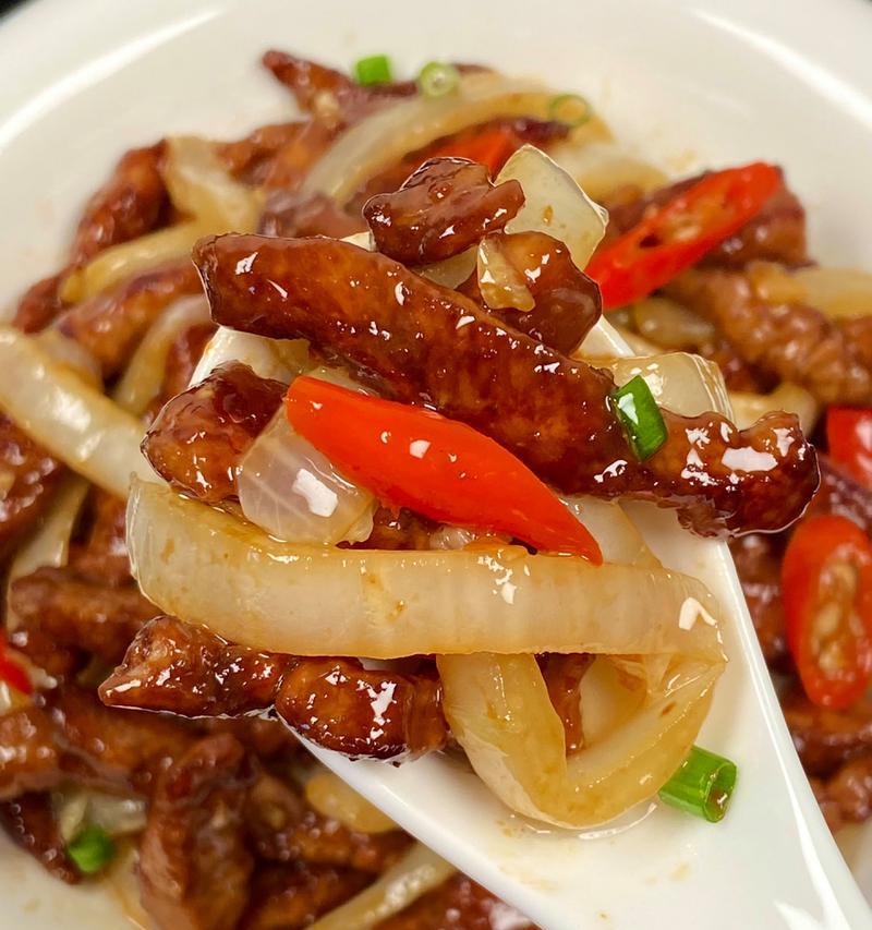 白菜梗炒肉的做法是什么？如何炒出鲜嫩多汁的口感？