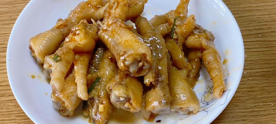酸辣柠檬凤爪的制作方法（让你在家也能轻松做出饭店级美食）