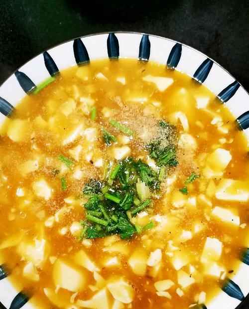 教你家常版蟹黄烧豆腐的制作方法（美味可口的家常菜）